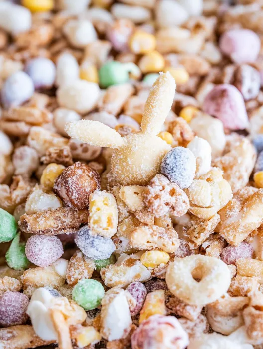 A bowl of cereal with a bunny shaped marshmallow.