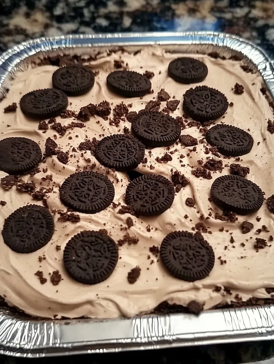 A dessert with chocolate and Oreo cookies.