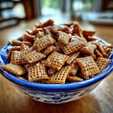 A bowl of toffee chex mix.