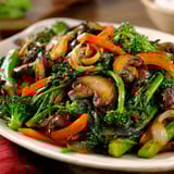 A plate of sautéed vegetables.