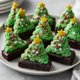 A plate of Christmas tree brownie bites.