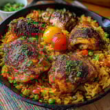 A plate of Caribbean chicken and rice.