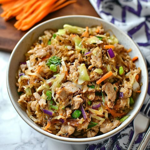 A bowl of meat and vegetables.