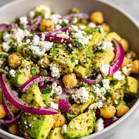 A bowl of chickpea feta avocado salad.
